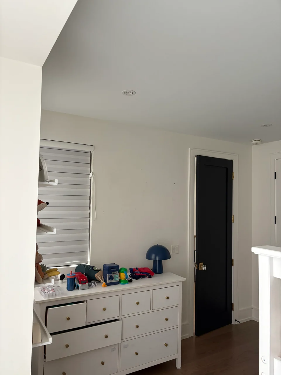 After: light neutral bedroom walls beside the same white dresser
